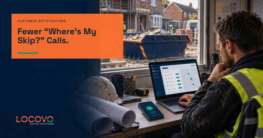 Skip hire operator handling a customer call beside a booking dashboard.